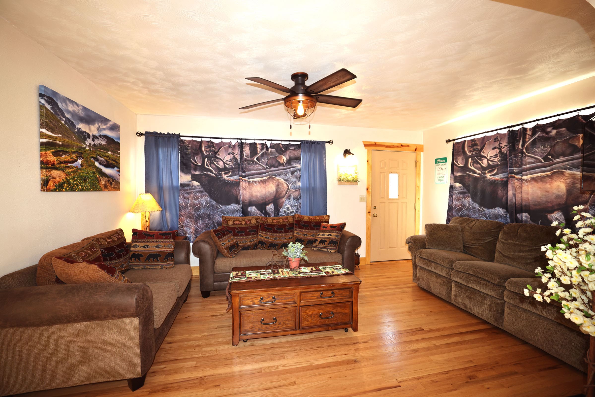 A living room with couches and a table