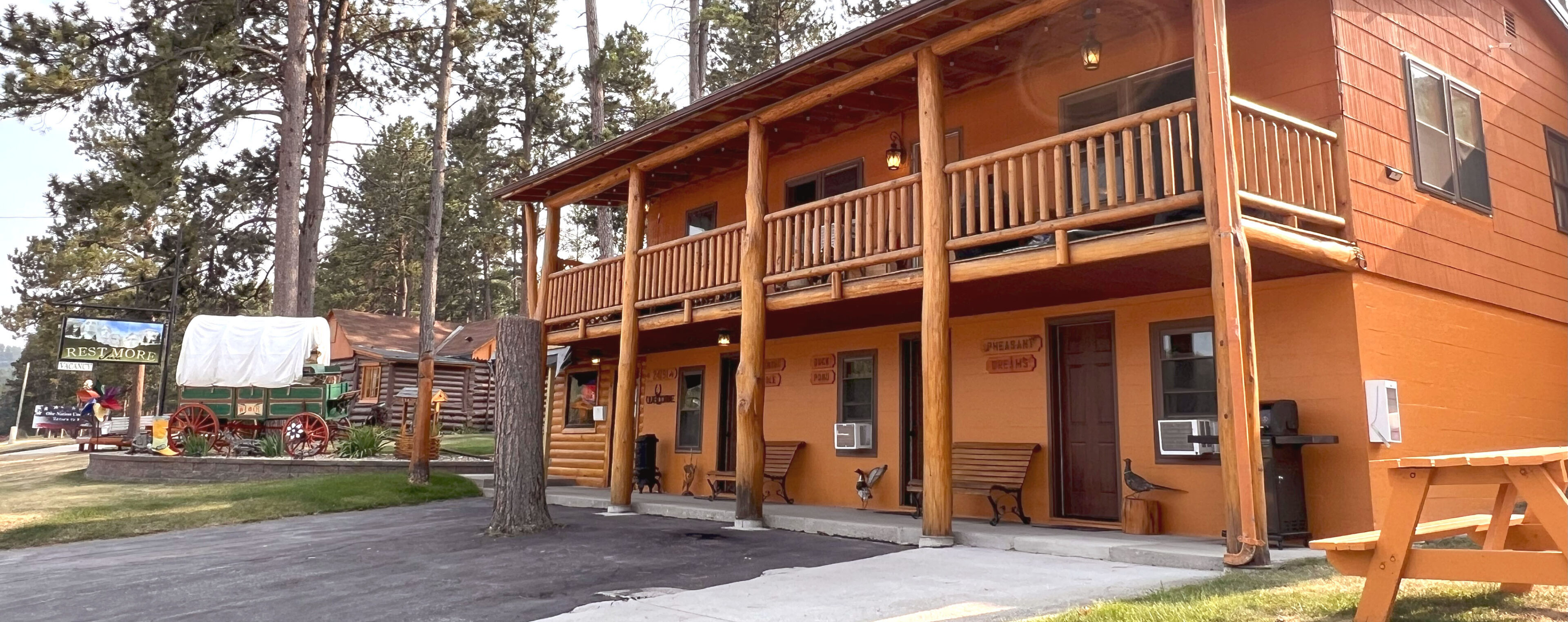 A building with wooden railings and a porch.