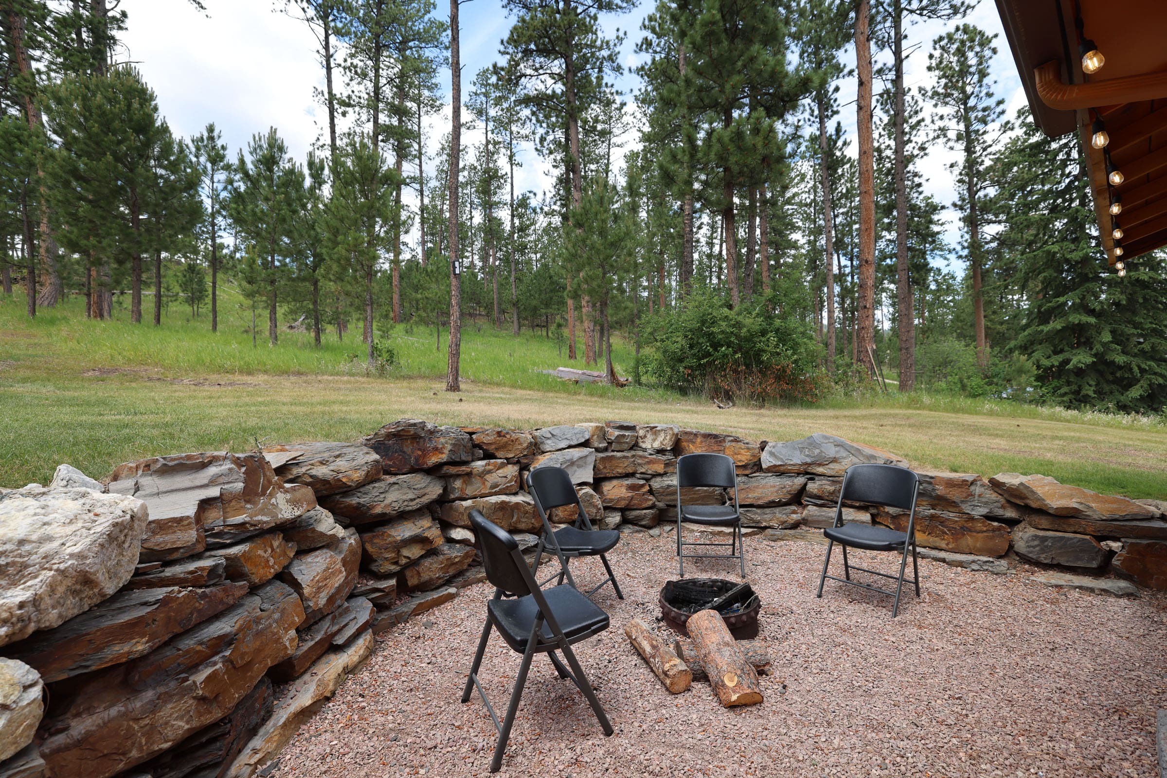 A group of chairs sitting in the dirt.